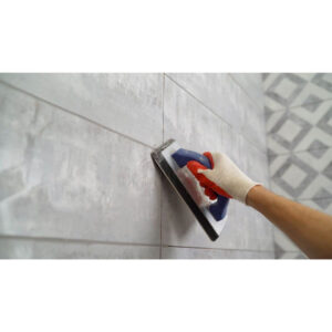 Applying grout to tiles | building material reviews