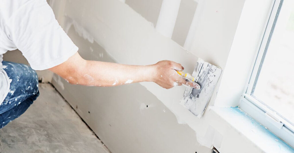 Plasterboard wall being prepared for Paint | Building Material Reviews 