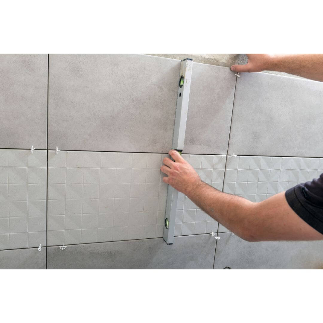 Tilers applying Tiles onto Studs | Building Material Reviews